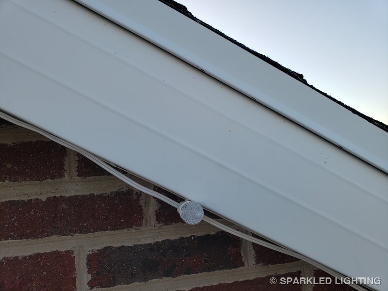 Christmas lights installed on fascia close-up on a Utah home