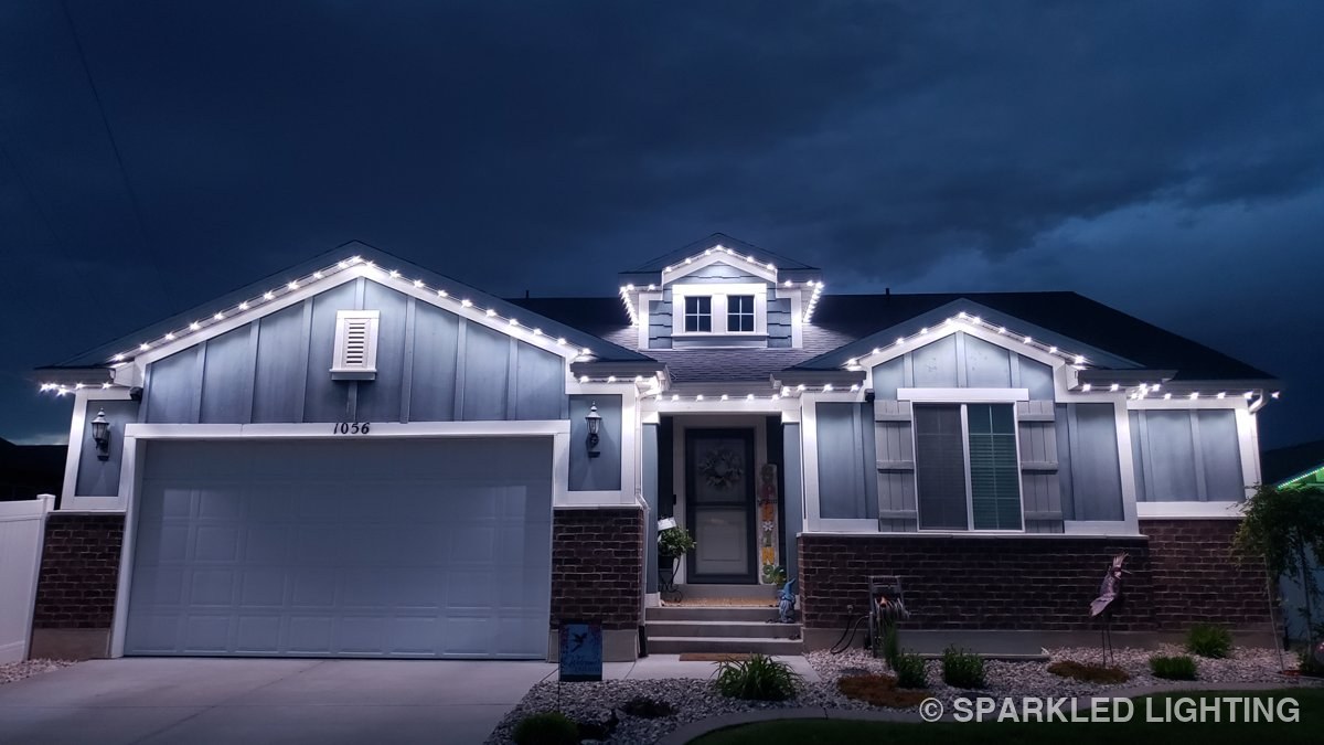 The same Clearfield Utah home lit in pure white permanent LED lights