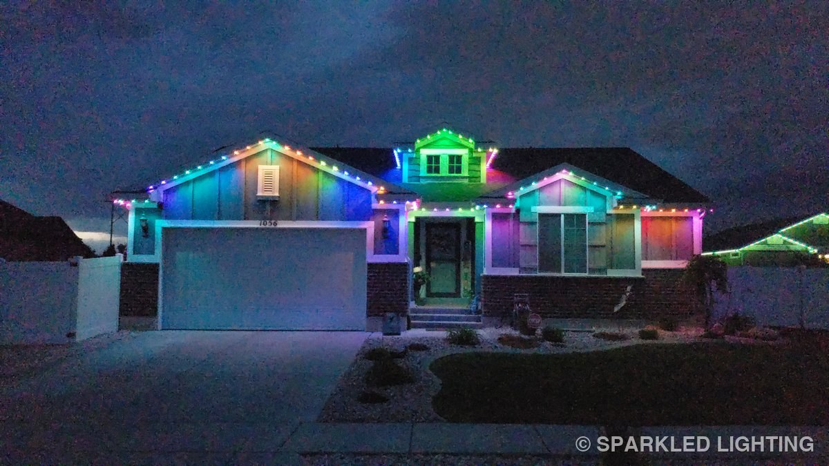 The same Clearfield Utah home lit in a full color spectrum