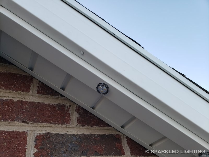 Permanent LED lights installed on soffit close-up on a Utah home