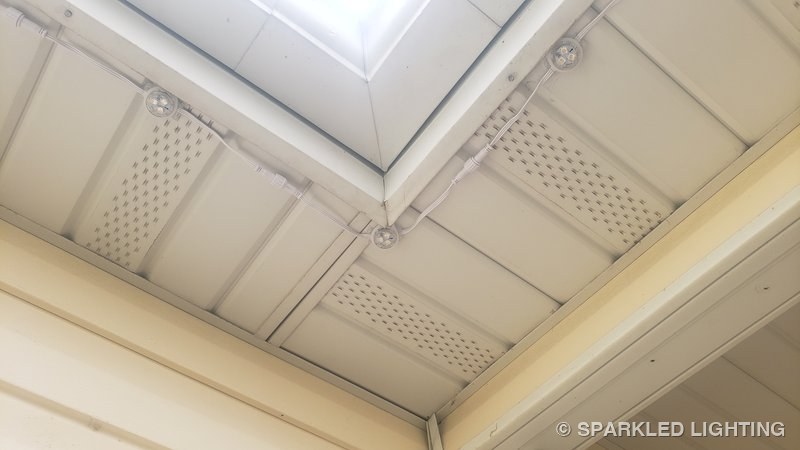 Removable RGBW lights installed on corner close-up on a Utah home