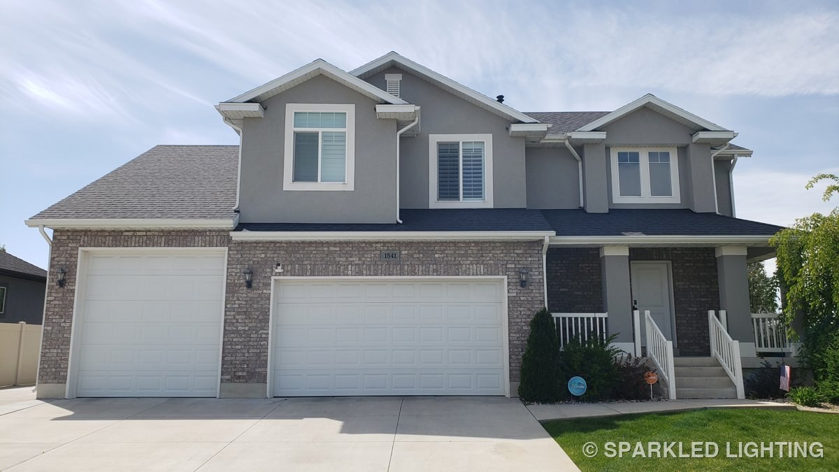 A Layton Utah two story home by day with SmartClip LED lights installed and invisible from the street