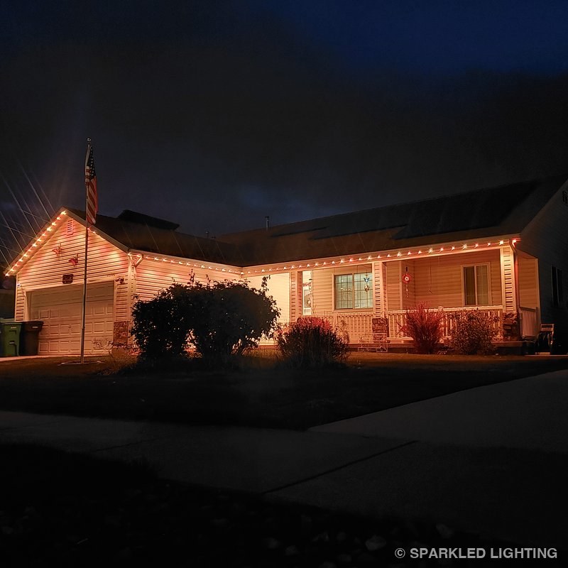 SmartClip LED lights installed on a single story house on a Roy Utah home in warm white
